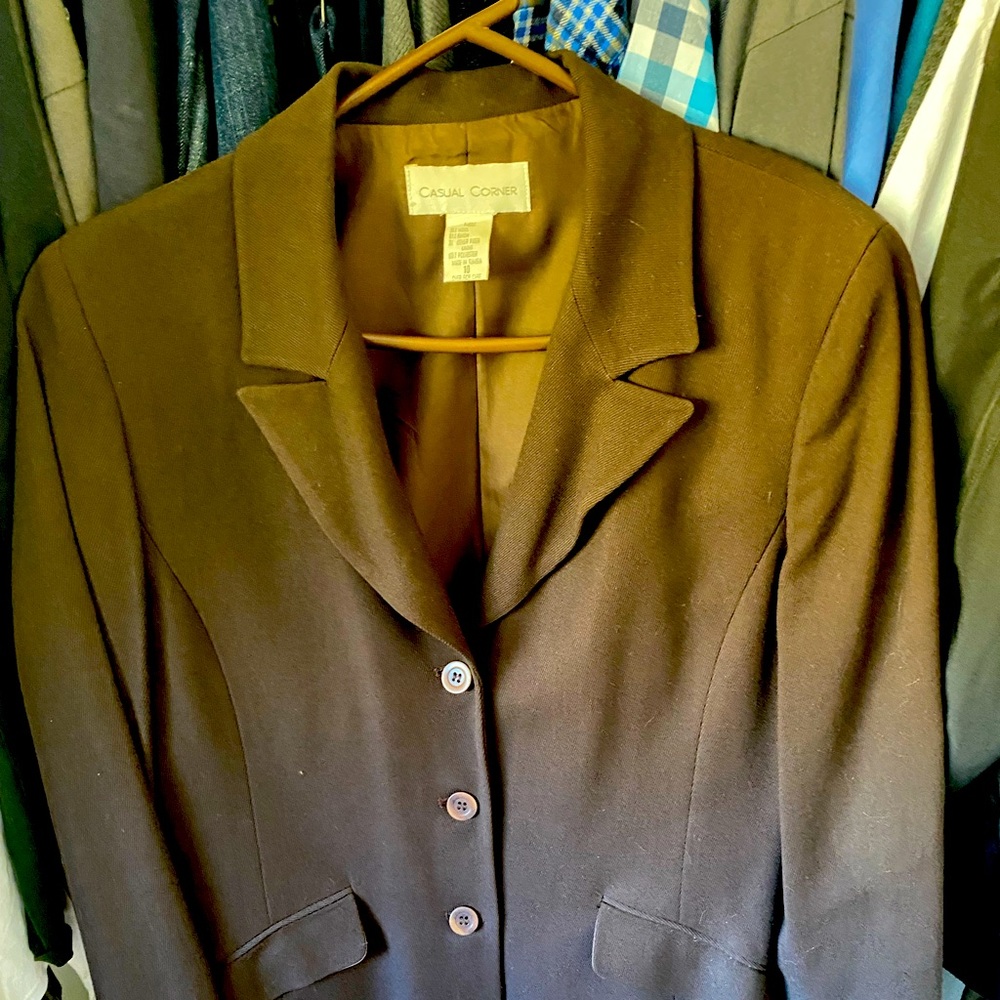 Brown suit- blazer with long skirt. Very classic and cute on!